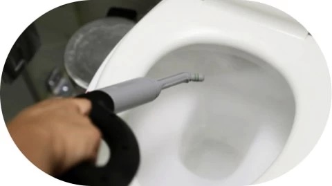 Steam cleaning a bathroom